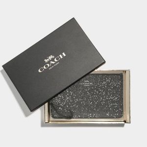 Coach Small Wristlet with star glitter